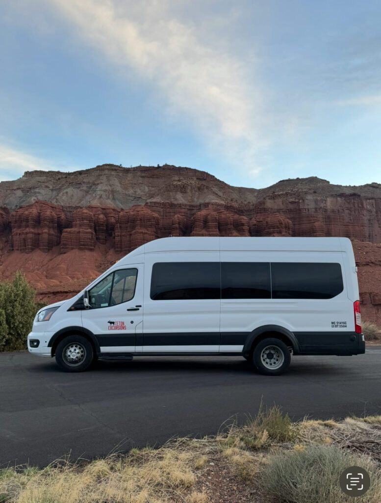 Raised-roof Ford Transit dually van used for private multi-day tours with Teton Excursions